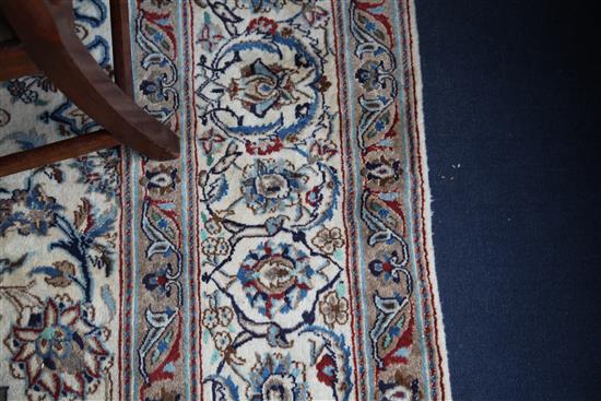 A Nain part silk carpet, 11ft 2in by 8ft.